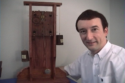 John Tope with wooden movement test stand